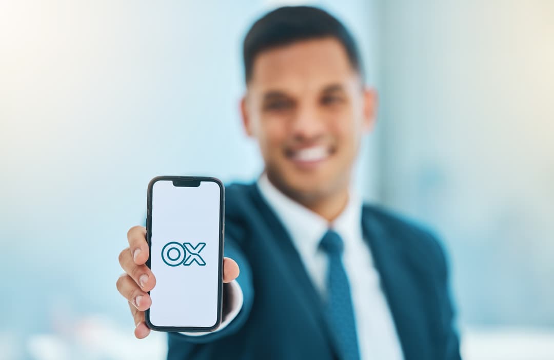 Person using Omexi Pay on phone